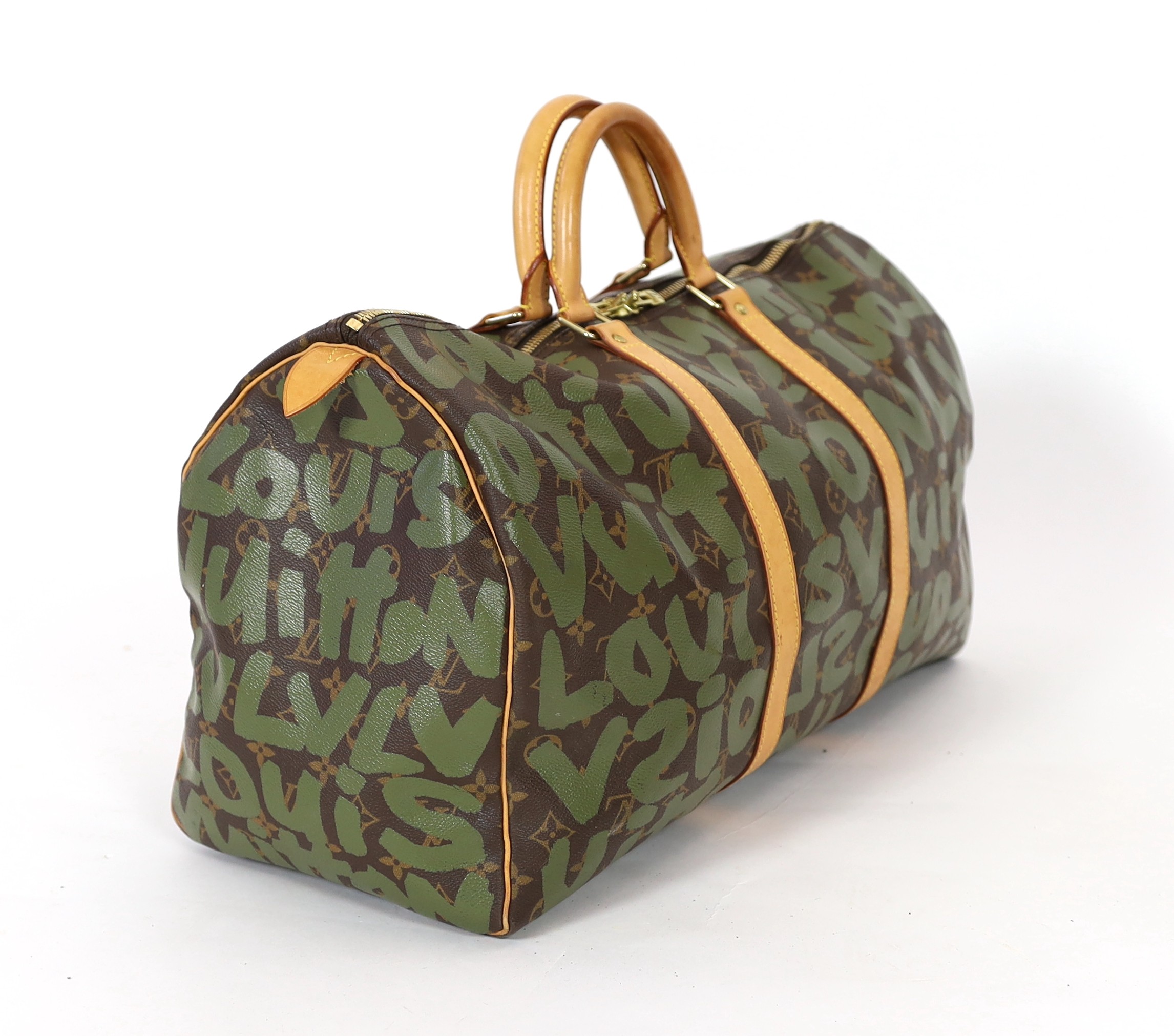 A vintage 2001 Louis Vuitton Stephen Sprouse Khaki Green Monogram Graffiti Keepall 50